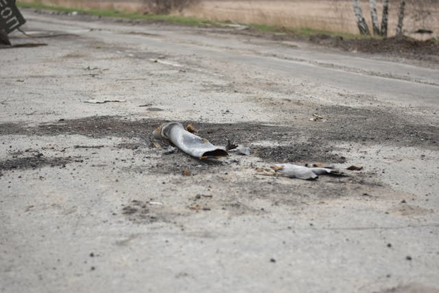 Photo by Serhii Bondarchuk: https://www.pexels.com/photo/missile-lying-on-the-road-11849155/